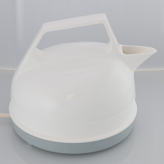 Electric Kettle with commercial packaging and instruction pamphlet